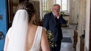Father reacting during a wedding first look